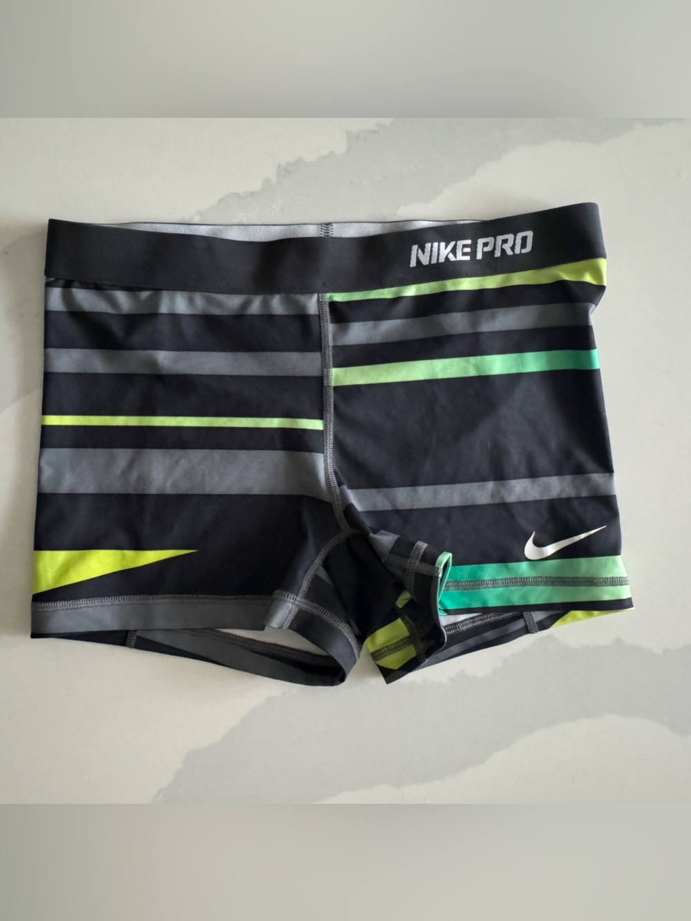 Nike Women’s Black Athletic Shorts with Lime and Gray Stripes